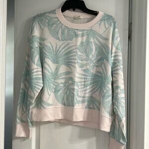 Pink cropped Z supply sweater size medium, has tropical palms